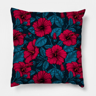 Red hibiscus flowers on dark blue Pillow