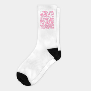 if you are neutral in situations of injustice you have chosen the side of the oppressor (activist quote in groovy pink) Socks