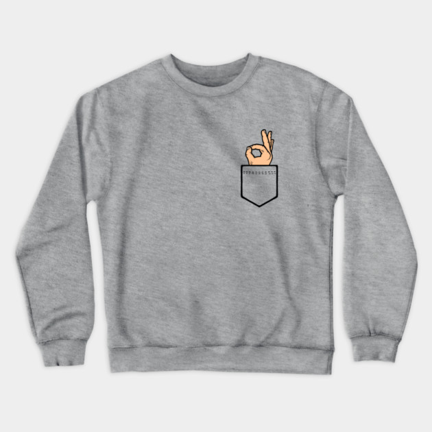 Pocket Ok Sign Crewneck Sweatshirt by dumbshirts