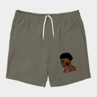 Proud African Woman with West African Pattern Shorts