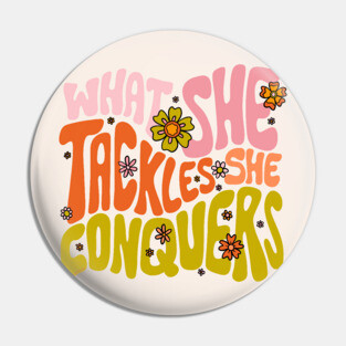 What She Tackles She Conquers Pin