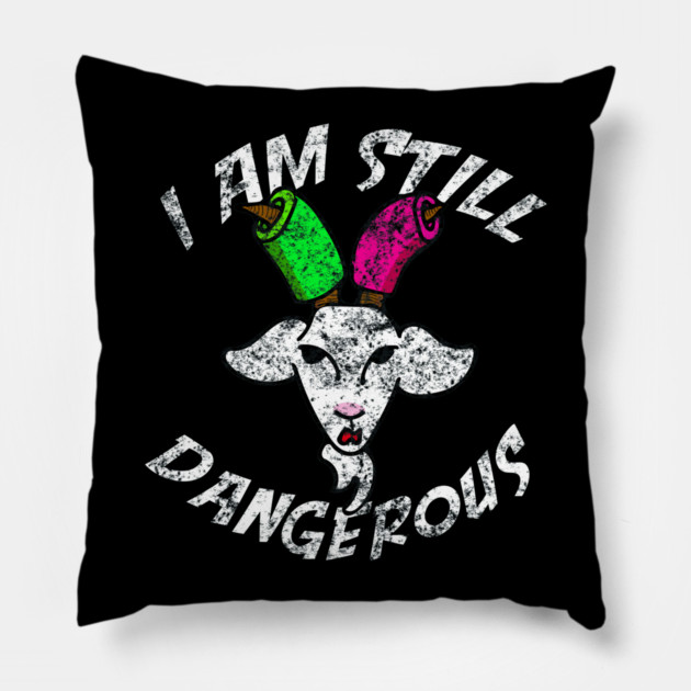 I Am Still Dangerous Goat with Pool Noodles on Horns Pillow by belownormal