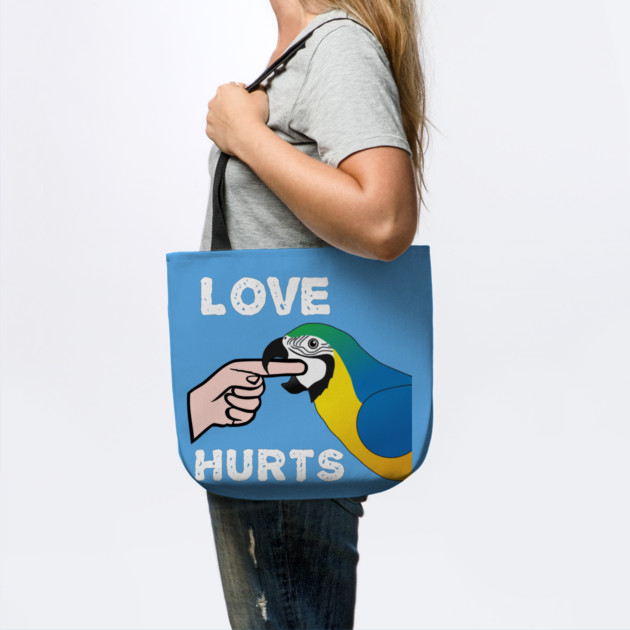 Love Hurts Blue and Gold Macaw Parrot biting by Einstein Parrot