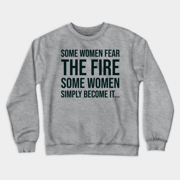 Some women fear the fire some simply become it... Crewneck Sweatshirt by UrbanLifeApparel