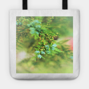 Fresh Greenery and Plant Life- Pine tree, plants, bokeh background Tote