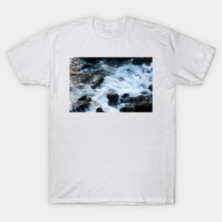 A breaking surge of sea water over rocks, Isle of Skye, Scotland T-Shirt