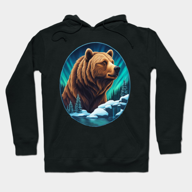 Grizzly Bear Above The Snowy Forests River and Snow Hoodie by BirdsnStuff