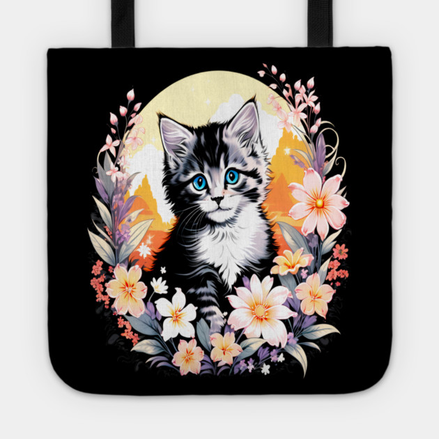 Black and Grey Kitten Surrounded by Spring Flowers Tote by BirdsnStuff