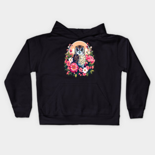 A Cute Short Eared Owl Surrounded by Bold Vibrant Spring Flowers Kids Hoodie