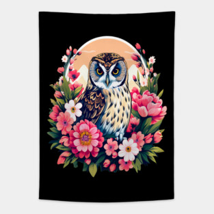 A Cute Short Eared Owl Surrounded by Bold Vibrant Spring Flowers Tapestry