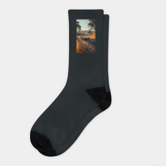 Futuristic Muscle car Driving on Country Road Socks by Vinokurio