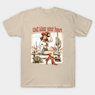 Well bless your heart; cowgirl; country; boots; cowgirl boots; western; desert; cactus; cacti; country and western; pin up girl; sass; sassy; southern; bless; sarcastic; sarcasm; T-Shirt