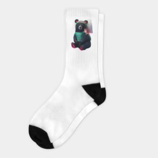 black bear wearing a green bib with the text “WHAT YOU MEAN JUICE FREE?” and a green hat with red dots. The bear is holding a fish in its left paw and sitting with its right paw resting on its leg, displaying pink pads on the soles of its feet Socks