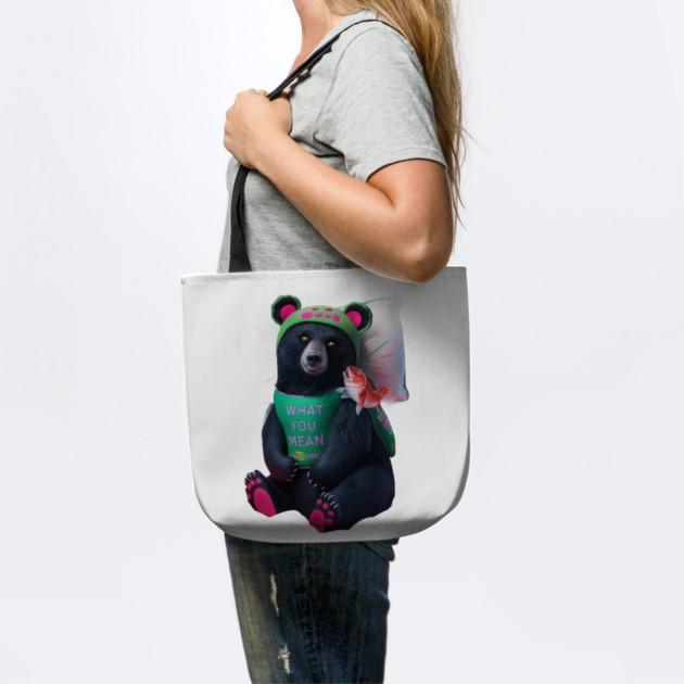 black bear wearing a green bib with the text “WHAT YOU MEAN JUICE FREE?” and a green hat with red dots. The bear is holding a fish in its left paw and sitting with its right paw resting on its leg, displaying pink pads on the soles of its feet by animegirlnft