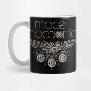 Macedonia a Stylized Font, Positioned Above and Below a Symmetrical Floral Pattern with Various Flowers and Leaves Mug