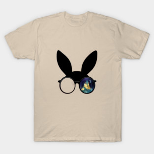 Pair of Round Glasses with One Lens Showing a Moonlit Castle Scene and Playful Rabbit Ears on Top T-Shirt