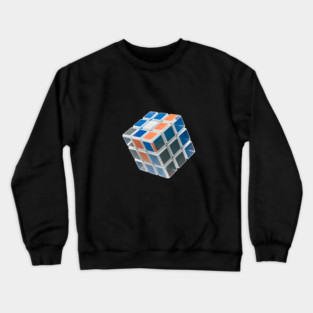 Cube is Partially Solved, with Visible Colors Including Blue, White, Orange, and Grey Crewneck Sweatshirt
