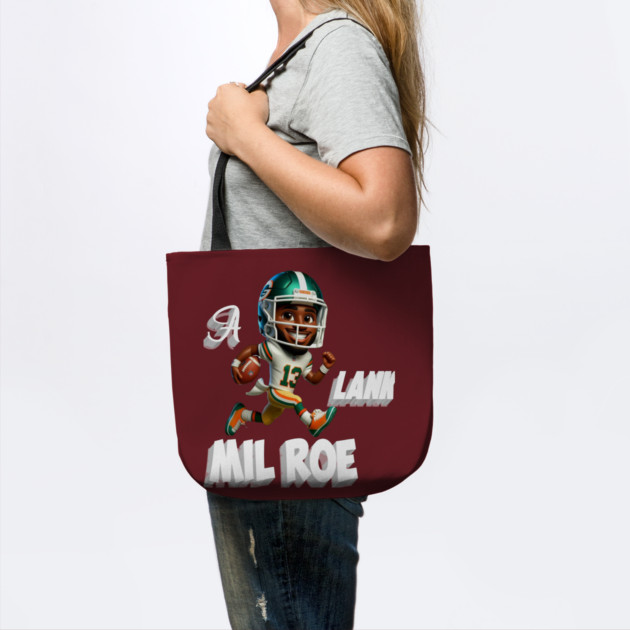 A Lank Milroe America football by Nizar clothing store 