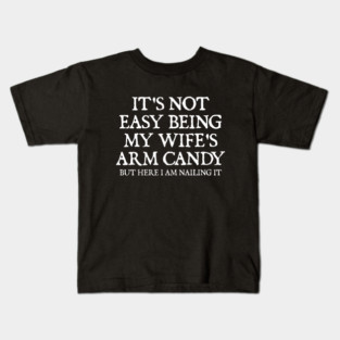 its-not-easy-being-my-wifes-arm-candy Kids T-Shirt