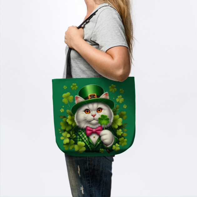 St. Patricks Day White Irish Cat Wearing A Leprechaun And Holding A Shamrock by Creatifly Graphic Tees