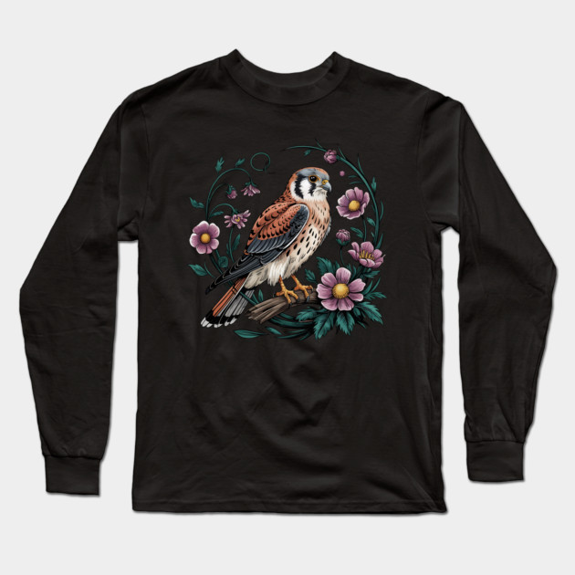 American kestrel Surrounded by Purple Wildflowers Long Sleeve T-Shirt by BirdsnStuff