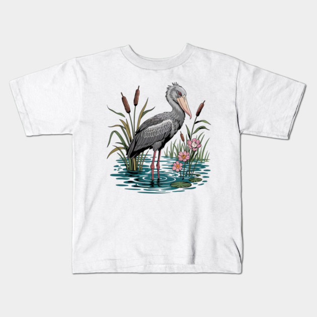 Shoebill Stork Among Wetland Flowers Kids T-Shirt by BirdsnStuff
