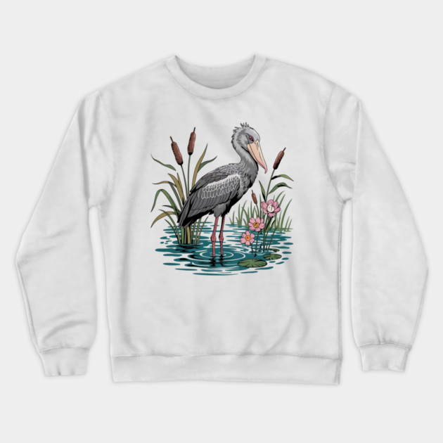 Shoebill Stork Among Wetland Flowers Crewneck Sweatshirt by BirdsnStuff