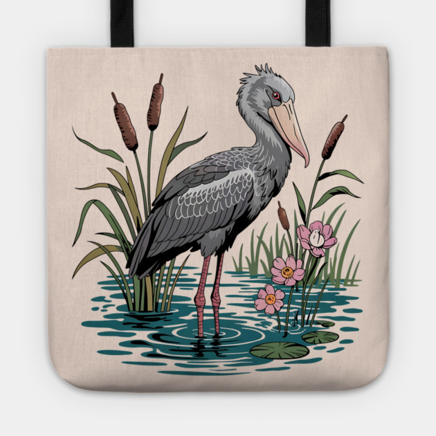 Shoebill Stork Among Wetland Flowers Tote by BirdsnStuff