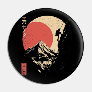 Ice Climber Scaling Mountain Under Rising Sun Pin