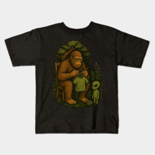 Bigfoot Sewing a Shirt for an Alien Kids T-Shirt