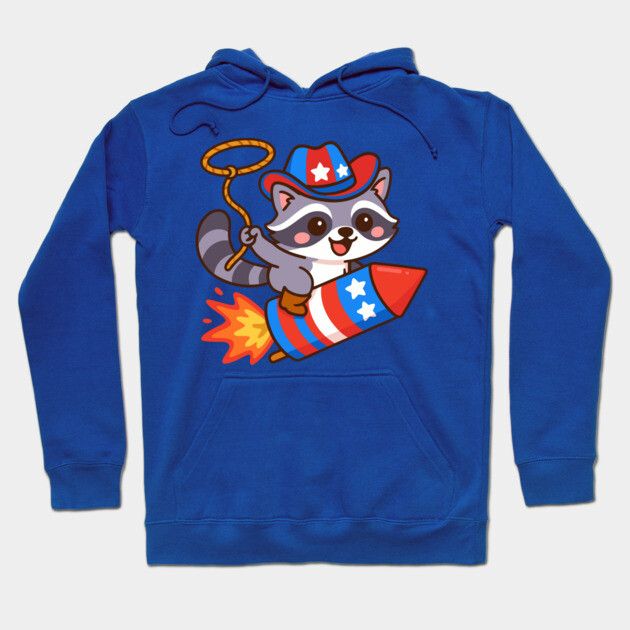 Cute Cowboy Raccoon Riding Firework – 4th of July Rocket Rodeo Animal Hoodie by DonWillisJrArt