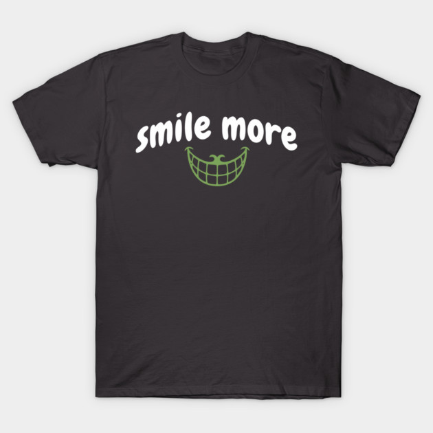 Smile More Cheshire Grin – Whimsical Smile Face with Creepy Grin, White Text Green Smile T-Shirt by DonWillisJrArt