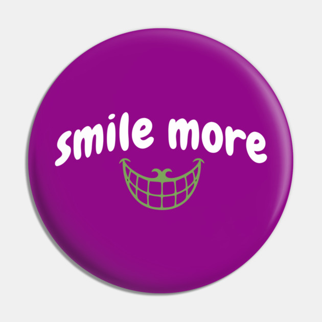Smile More Cheshire Grin – Whimsical Smile Face with Creepy Grin, White Text Green Smile Pin by DonWillisJrArt