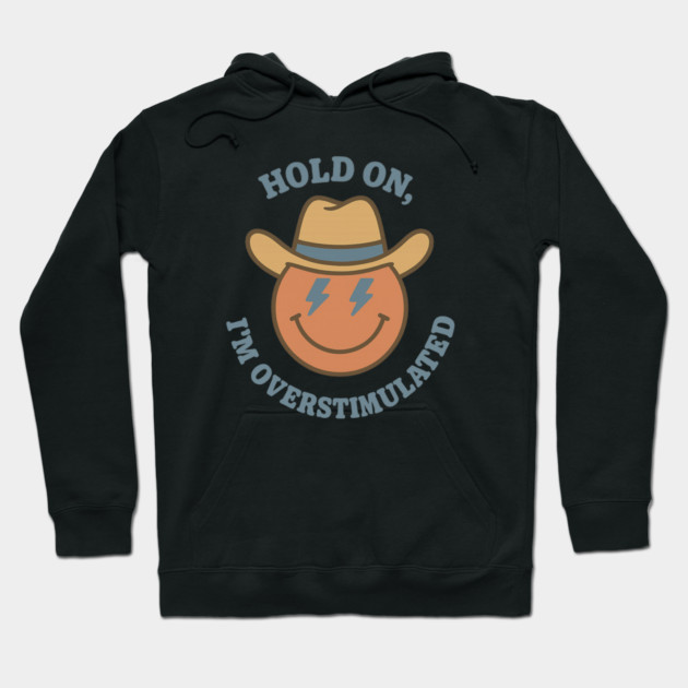 Hold On, I’m Overstimulated (Cowboy) Hoodie by Fauzi's Store