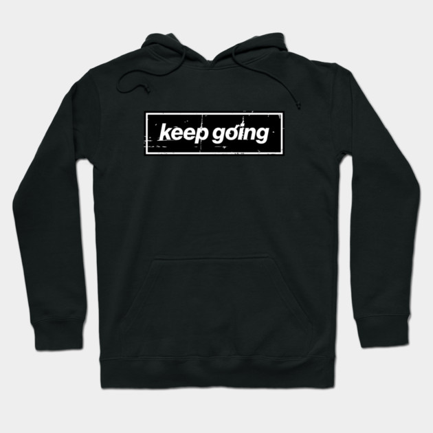 Keep Going Oasis Distressed Typography – Bold Positive Message Design Black Hoodie by Butter Creative