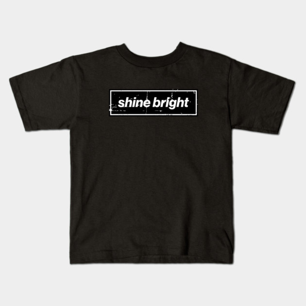 Shine Bright Oasis Distressed Typography – Bold Positive Message Design Black Kids T-Shirt by Butter Creative