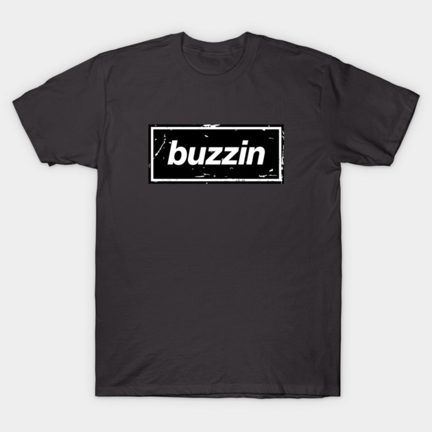Buzzin – Manchester Manc Slang Oasis Style Britpop Black T-Shirt by Butter Creative