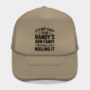 it's not easy to be randy's arm candy but here i am nailing it Hat