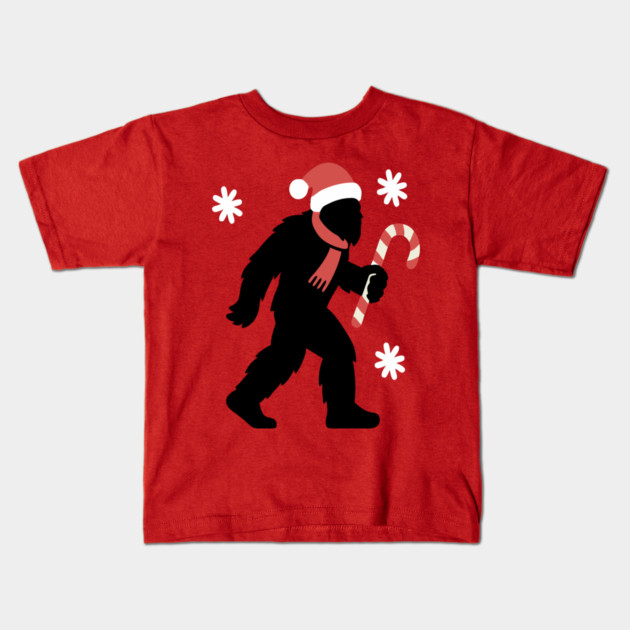 Christmas Bigfoot Santa and Candy Cane Kids T-Shirt by DonWillisJrArt