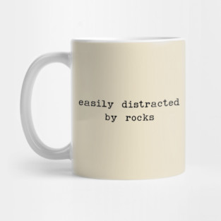 Easily distracted by rocks - sarcastic quotes Mug