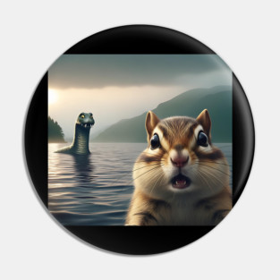 Scared chipmunk standing near Loch Ness in Scotland takes selfie with Loch Ness Monster Nessie Pin