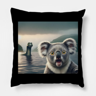 Scared koala bear standing near Loch Ness in Scotland takes selfie with Loch Ness Monster Nessie Pillow