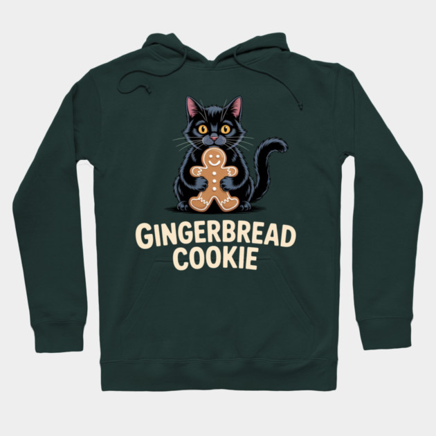 Cute Black Cat with Gingerbread Cookie Christmas Humor Hoodie by Creatifly Graphic Tees