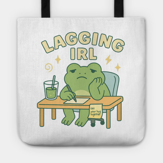 Lagging IRL Shirt | Cute Frog Procrastination Tee by Leaf & Lee – Relatable Softcore Humor for Overthinkers & Tired Brains Tote by Anne Lee