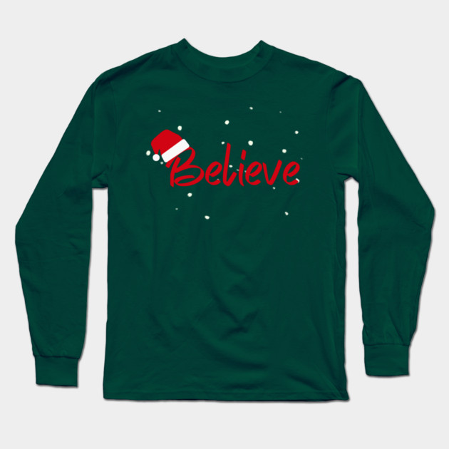 Believe Christmas Santa Hat Snowy Holiday Lettering Long Sleeve T-Shirt by Creatifly Graphic Tees