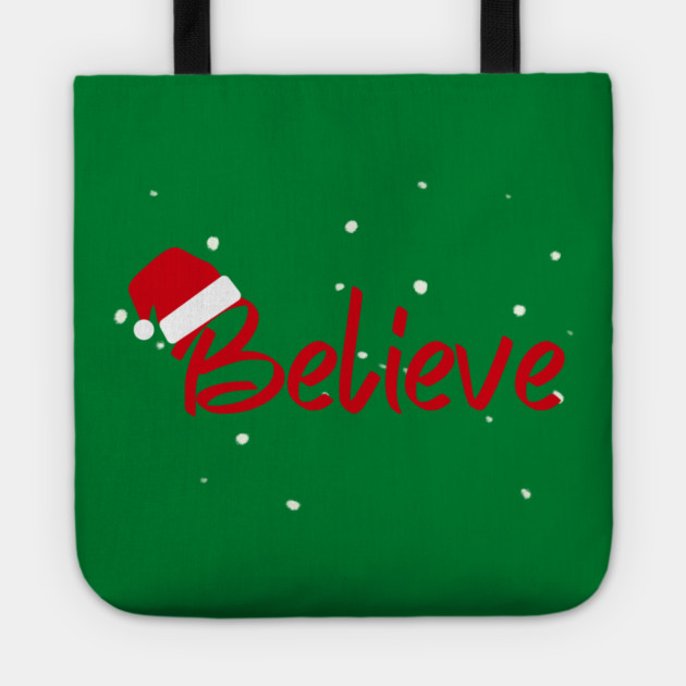 Believe Christmas Santa Hat Snowy Holiday Lettering Tote by Creatifly Graphic Tees