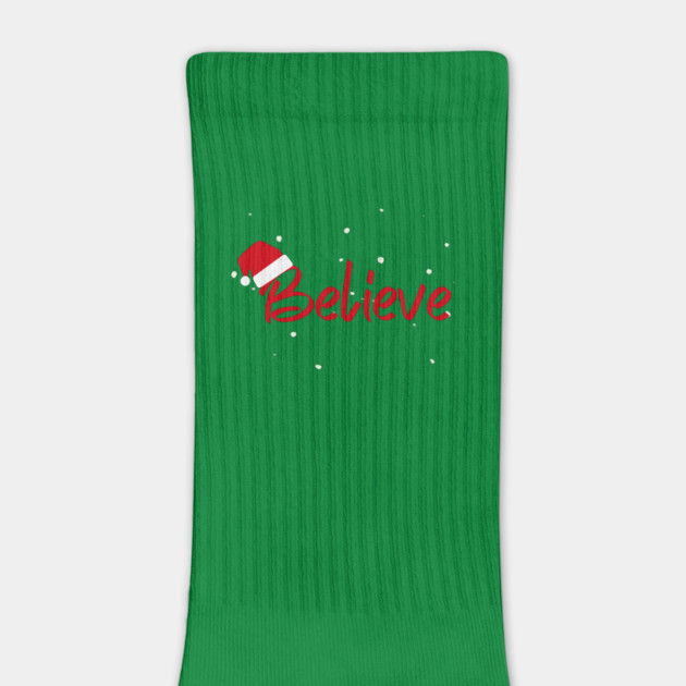 Believe Christmas Santa Hat Snowy Holiday Lettering by Creatifly Graphic Tees