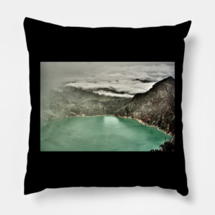 An unreal vision of the crater shrouded in smoke. Pillow