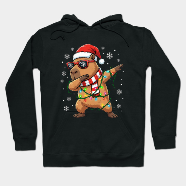 Cool Dabbing Capybara Christmas – Festive Holiday Vibes Hoodie by Creatifly Graphic Tees