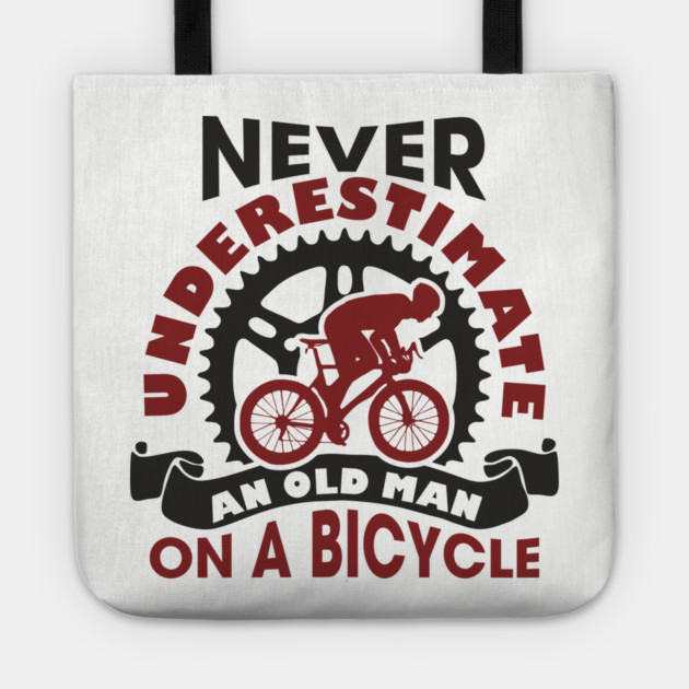 Never Underestimate an Old Man on a Bicycle Tote by Anticorporati